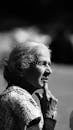 pexels photo 35692593 35692593 Elegant black and white portrait of a contemplative senior woman outdoors.